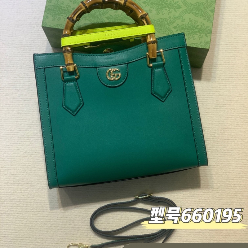 G*u*i top handle bags